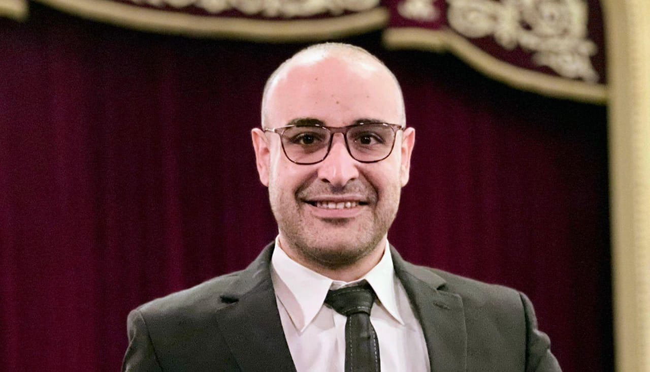الدكتور محمد العجمي يشارك في معرض القاهرة للكتاب برواية صحراء 22 